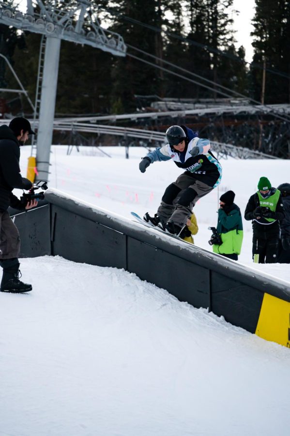 Ari Morrone performs a 50-50 grind on a rail in women’s street style finals at Dew Tour