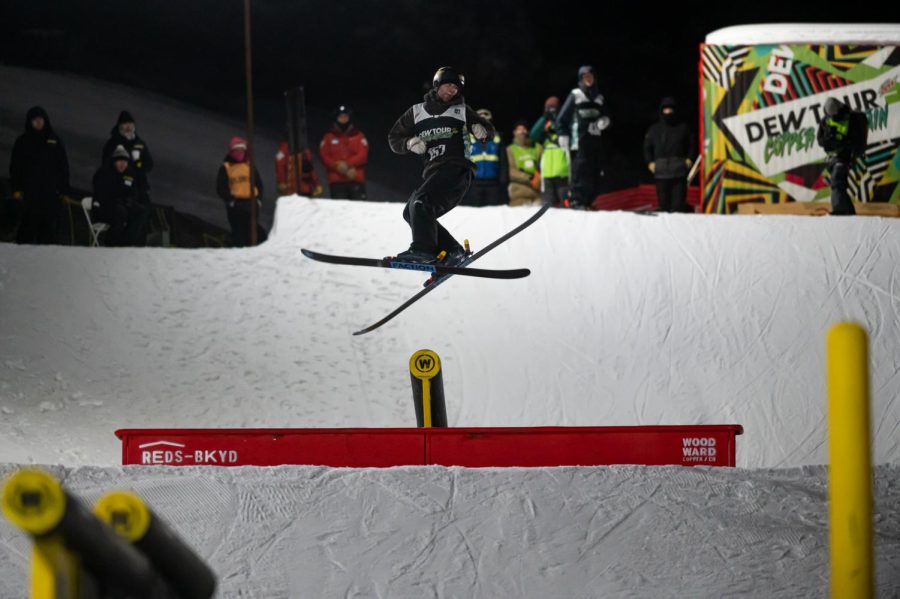 Alex Hall spins off one of the rails during men’s ski street style finals at Dew Tour