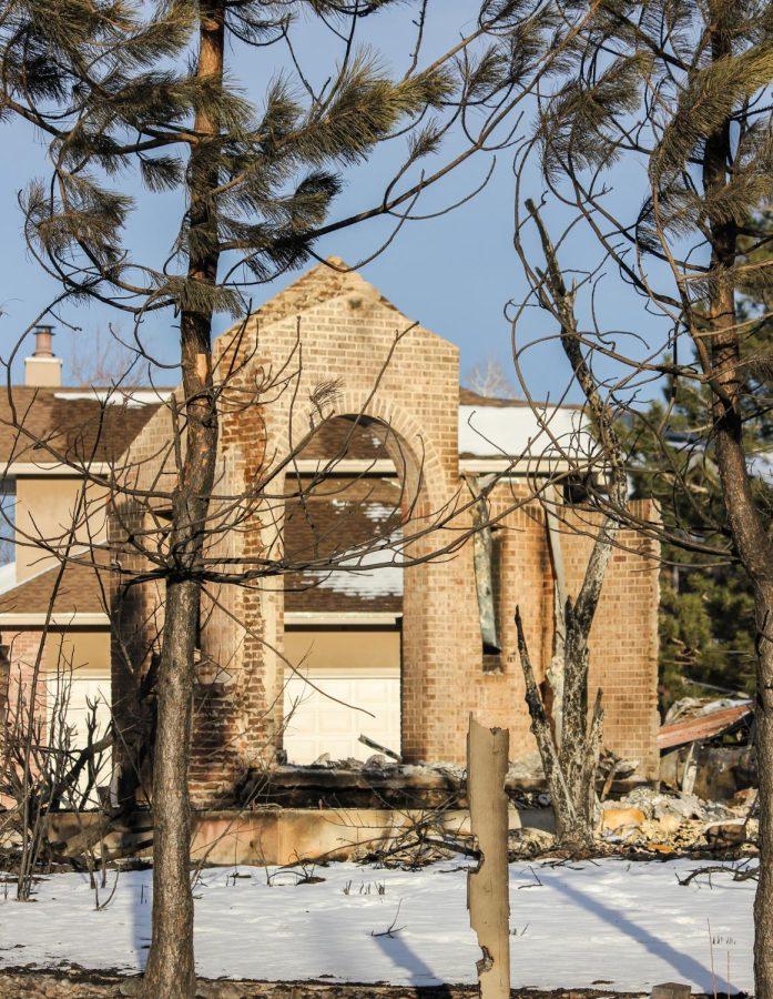 Only a brick column remains of this home.