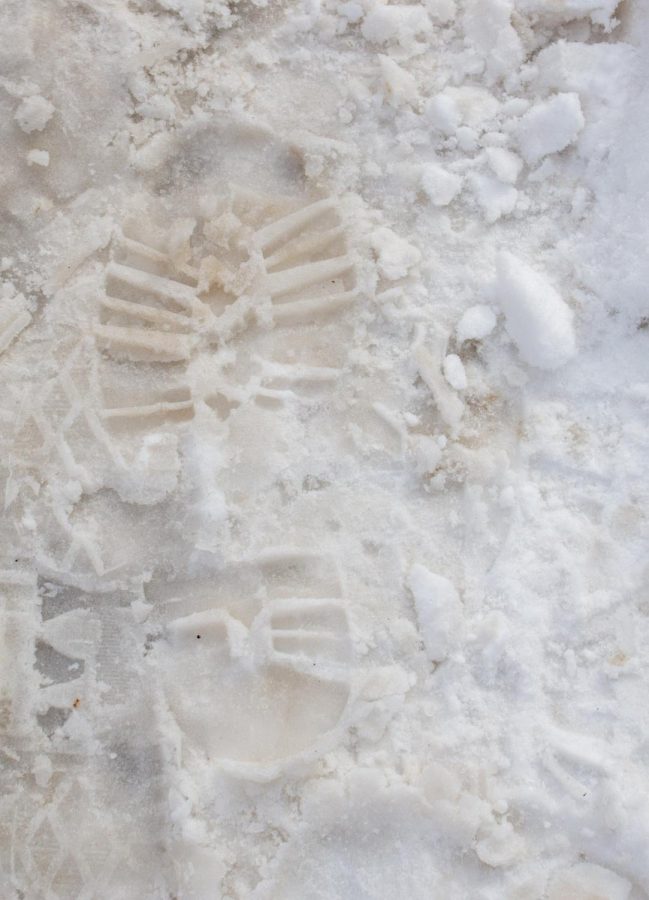 A fresh footprint in the snow after classes were excused in the Eddy building Jan 25 (Lee Medley | The Collegian) 