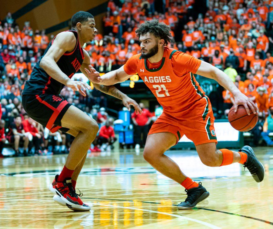 David Roddy (21) drives to the basket during the Sold Out Colorado State basketball game vs San Diego State University