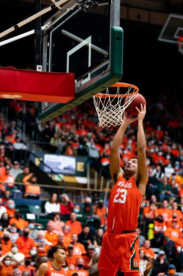 Isaiah Rivera (23) dunks during the Colorado State basketball game vs San Diego State University Feb. 4. CSU won58-57.