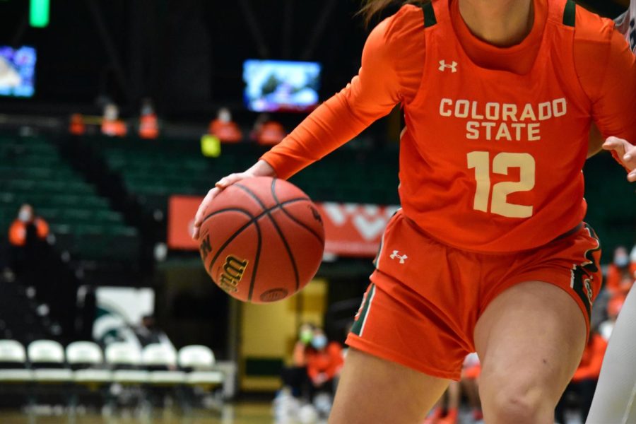 Colorado State Ram Clara Gomez (12) playing an aggressive offense with the ball during a game against the Utah State Aggies