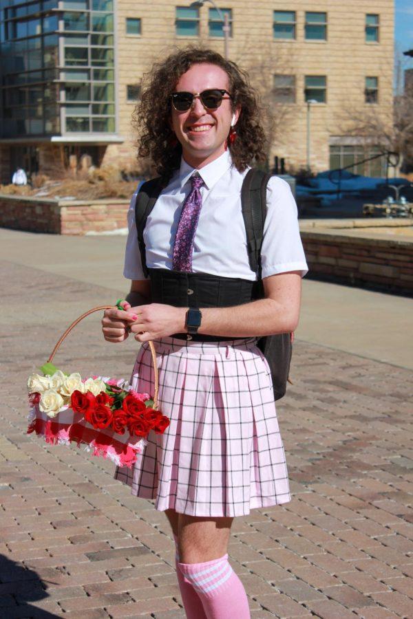 Andrew Spencer walked around campus giving out flowers and chocolate to students