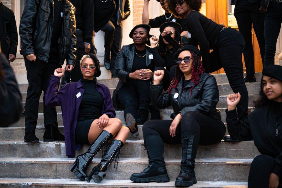 Kiah Nickels takes a photo of Colorado State University Students honor the Black Panther Party by participating Black Out event