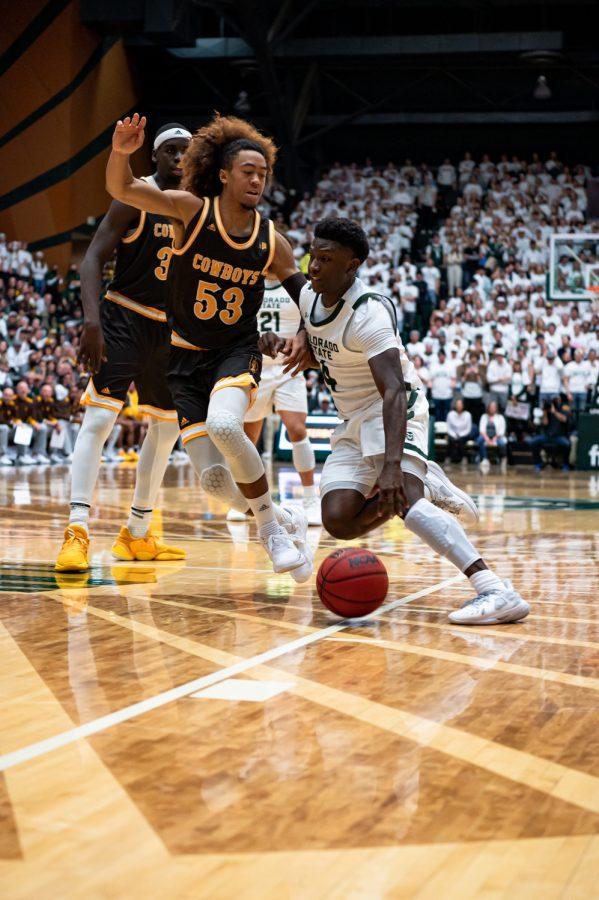 Isaiah Stevens (4) drives to the basket during the CSU basketball game vs University of Wyoming at Moby Arena