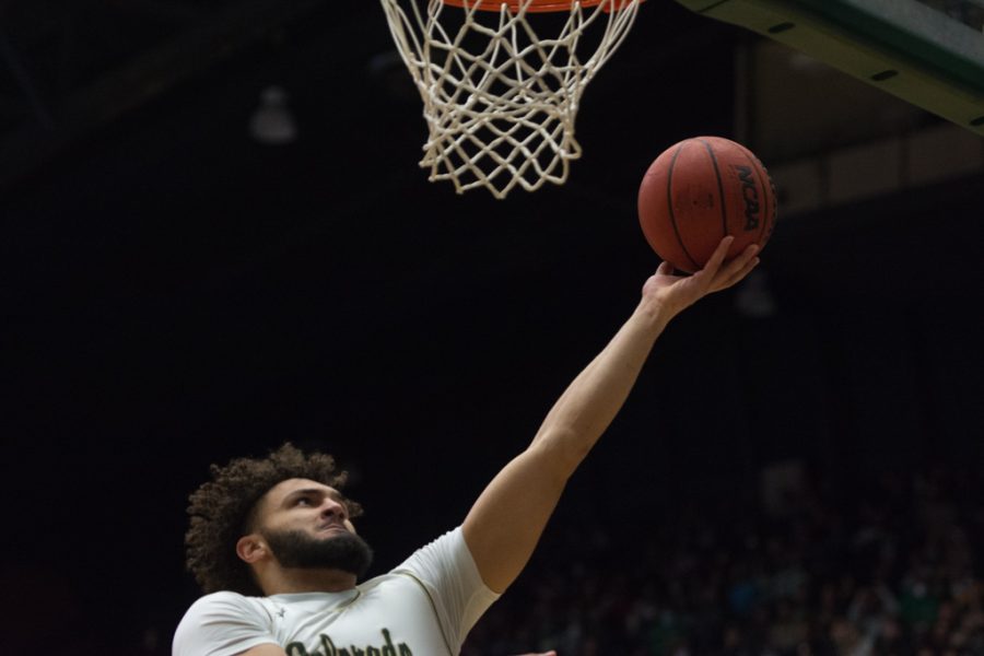 Colorado State guard David Roddy (21) lays the ball up against the California State University Fresno bulldogs Feb. 11, 2022.