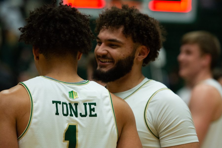 Colorado State guard David Roddy (21) and forward John Tonje (1) share a laugh after beating the California State Fresno bulldogs Feb. 11, 2022