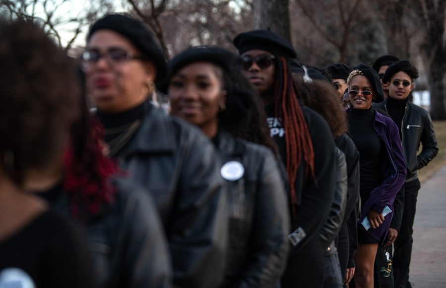 Breonna Abuya, during a Black Out event, honors the Black Panther Party Feb. 15