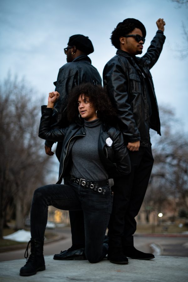 Ramsey Whitaker, Alizayna Walton and Stephan Galloway during a Black Out event, honor the Black Panther Party Feb. 15