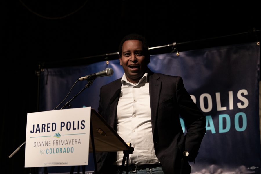 Rep. Joe Neguse speaks in front of Fort Collins residents at Avogadros Number, located at 605 S. Mason St., for Gov. Jared Polis’s re-election campaign Feb 18.