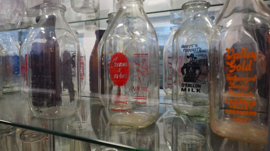 Milk bottles sit in a display case Feb. 4, 2022