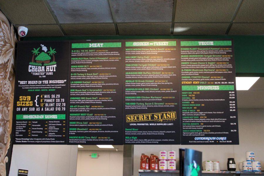 The Cheba Hut menu hangs over the ordering counter.