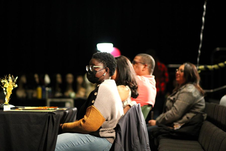 The judges wait patiently for the show to start.