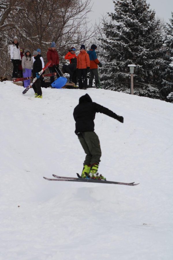 CSU students enjoy their snow day on campus by skiing and snowboarding.