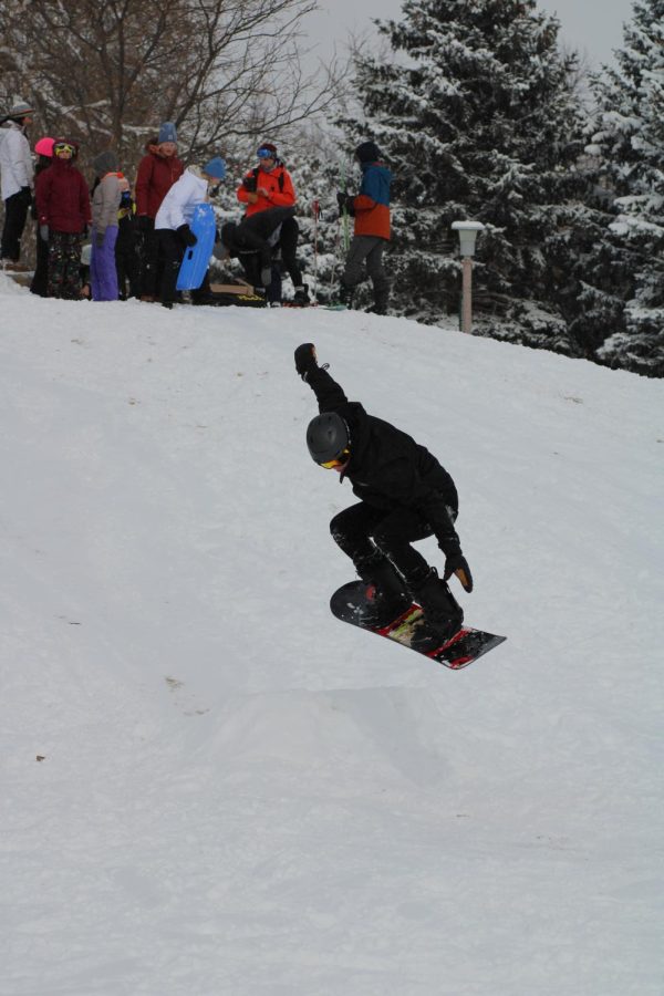 CSU students enjoy their snow day on campus, utilizing the snowy hills.