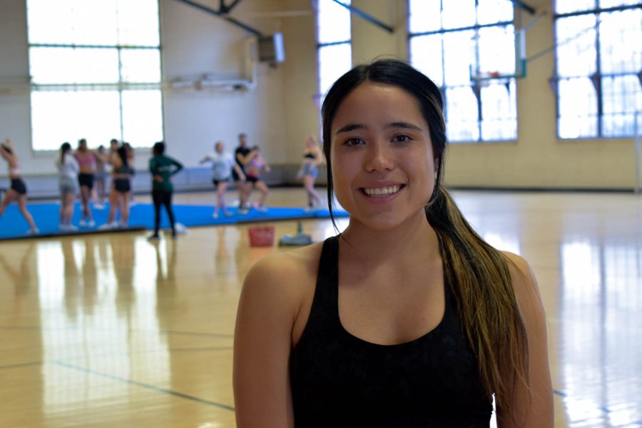 Bianca Gonzalez senior cheerleader at Colorado State University posing for a portrait during one of her final practices as a CSU cheerleader.