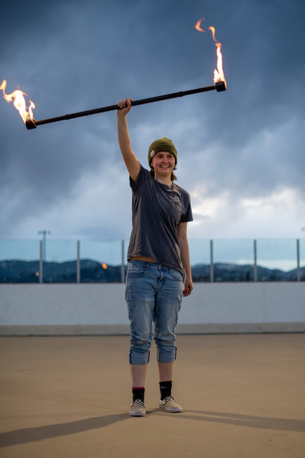 Hillary Johnson a student at Colorado State university practices her fire twirling on the Inter Mural fields March. 4.