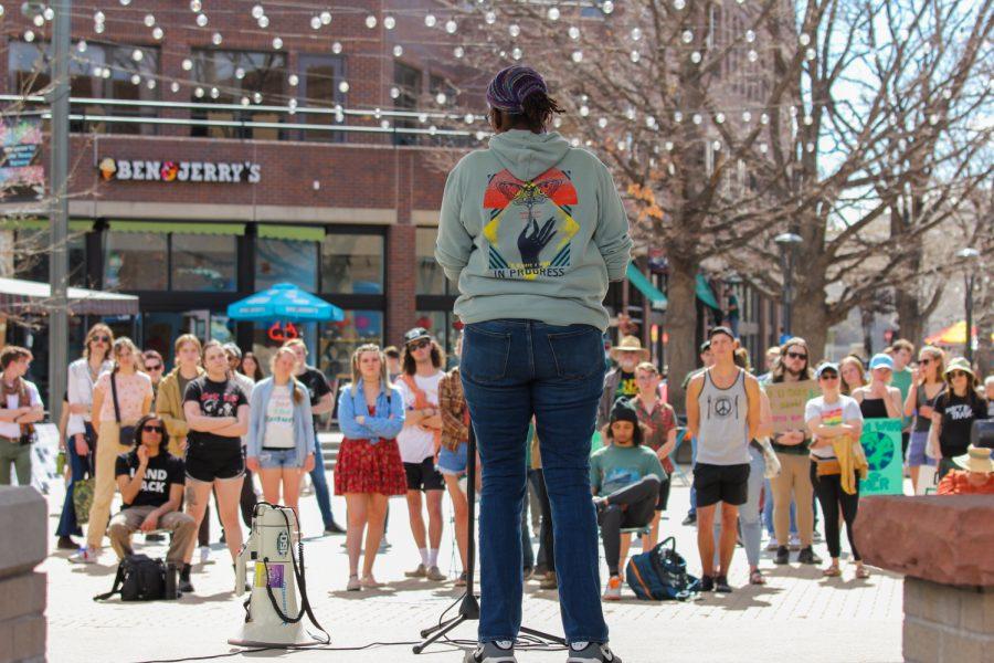 One of many speakers at the climate strike, shares her speech with the crowd.