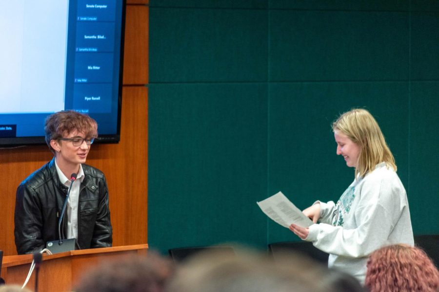 Alex Silverhart, Associated Students of Colorado State University senator for the College of Veterinary Medicine and Biomedical Sciences, is sworn in as the chair of the Budgetary Affairs Committee by ASCSU Chief Justice Erin Freeman, March 30, 2022. 
