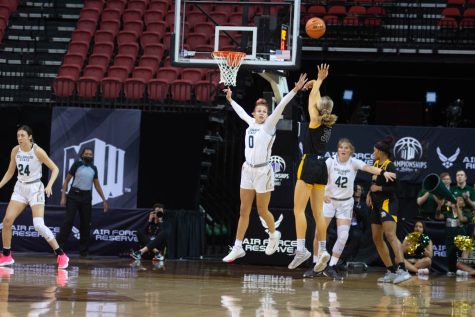 Colorado State University Kendyll Kinzer blocking San Jose Spartan player while on defense during the first game of the Mountain West Tournament Mar. 6, 2022.