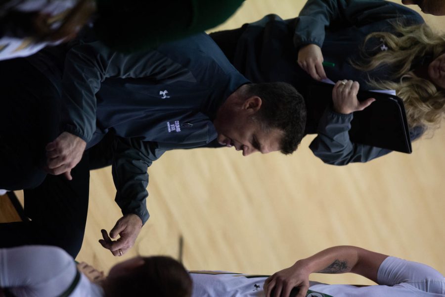 Couch Ryun Williams helps pump up the Colorado State Rams during a break at halftime during the final quarter of the first Mountains West Tournament The Rams win 82-43 ag