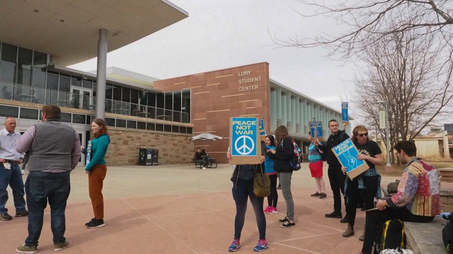 A group of Colorado State University students and Fort Collins community members stand outside the Lory Student Center March 3, 2022 to protest the invasion of Ukraine by the Russian military in recent weeks.