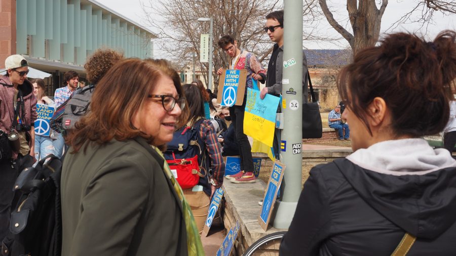 Colordo State University president Joyce McConnell speaks with a protestor at the Peace Vigil for Ukraine on the Lory Student Center plaza March 3, 2022