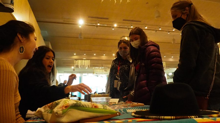 Colorado State Enviornmental Engineering major Claire Mcwilliams Sells her bead jewlery in the Lory Student Center ball room March 5, 2022.