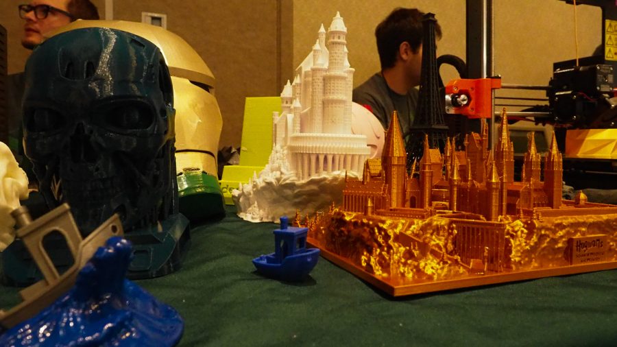 A collection of 3D printed models on a table at the TEDxCSU expo March 5, 2022.