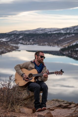 Cory Simmons demos an original song at his favorite practice to practice, Duncan’s Ridge, Feb 14, 2022. Simmons has recorded an album in Fort Collins and frequently plays at open mic nights.