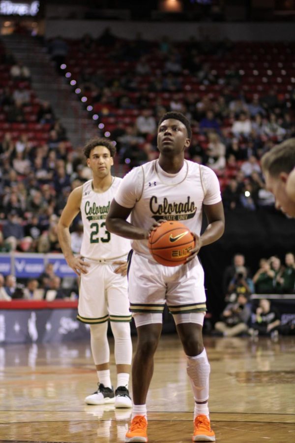 Isaiah Stevens (4, guard), prepares to shoot a three pointer.