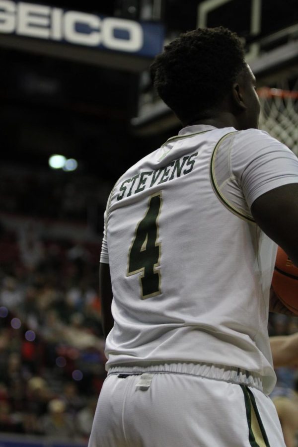 Isaiah Stevens (4, guard), prepares to throw the ball back into play.