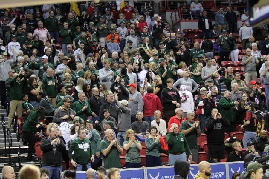 CSU fans jump out of their seats as the Rams win.