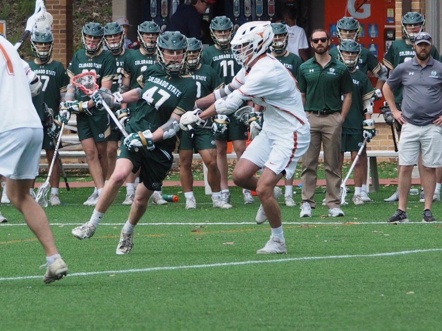 Colorado State midfielder Nils Holland fights off an attack from a Texas midfielder March 13, 2022.