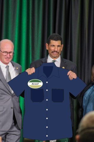 After leaving his position as the Colorado State University football head coach to pursue his passion for automotive care, Jay Norvell stands proudly with his newly acquired uniform March 29. (Photo illustration by Look! A Seal | The Daily Bilge)
