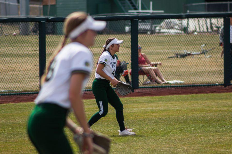 Ashley Michelena (4) standing at the outfield during a a Rams softball game.