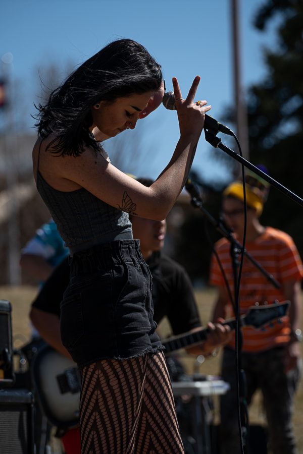 Hannah Rust, of the band Hygeia, sings an original song during K-Colorado State University’s FoolsFest Apr 1. “We’ve played together for a long time,” Rust stated, “but Hygeia as a band is only about six months old, so this was our first real chance to play our music for people.”