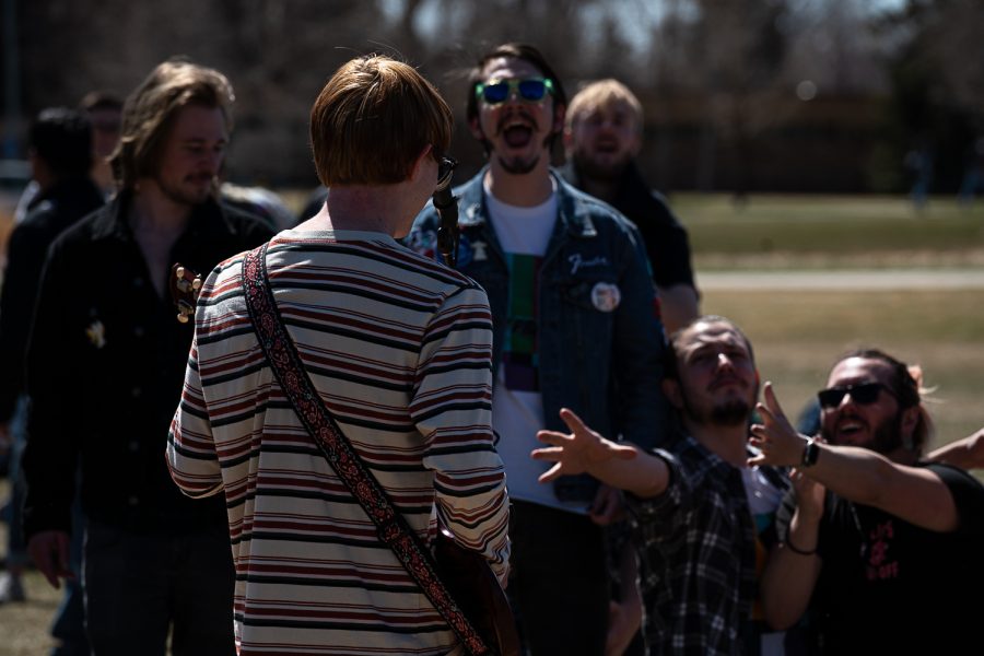 Tim Crews, of the band Hospital Socks, plays guitar while singing vocals at K-Colorado State University’s FoolsFest Apr 1. “It was great, the breeze was lovely,” Crews stated, “The crowd was great, usually people don’t move so much but they moved a little bit which was fun.”