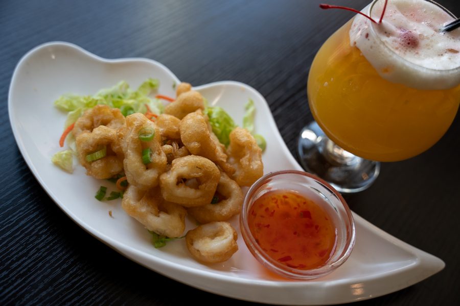 Calamari and a Mai Tai drink ordered from Tom Kha Thai Asian Bistro located at 144 North Mason Street Unit 8, Fort Collins Colorado Apr 2.