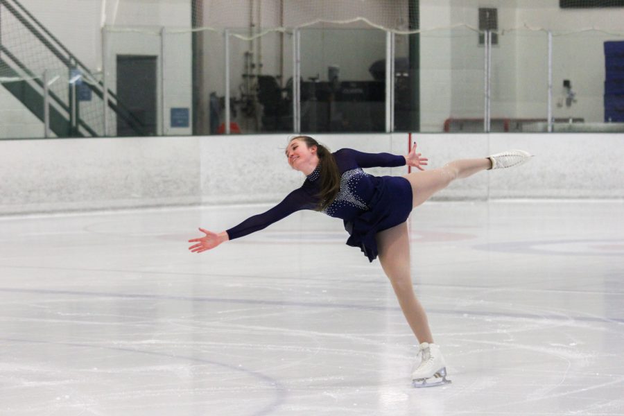 Alexis Foster performs an arabesque on the ice at the EPIC Ice rink.