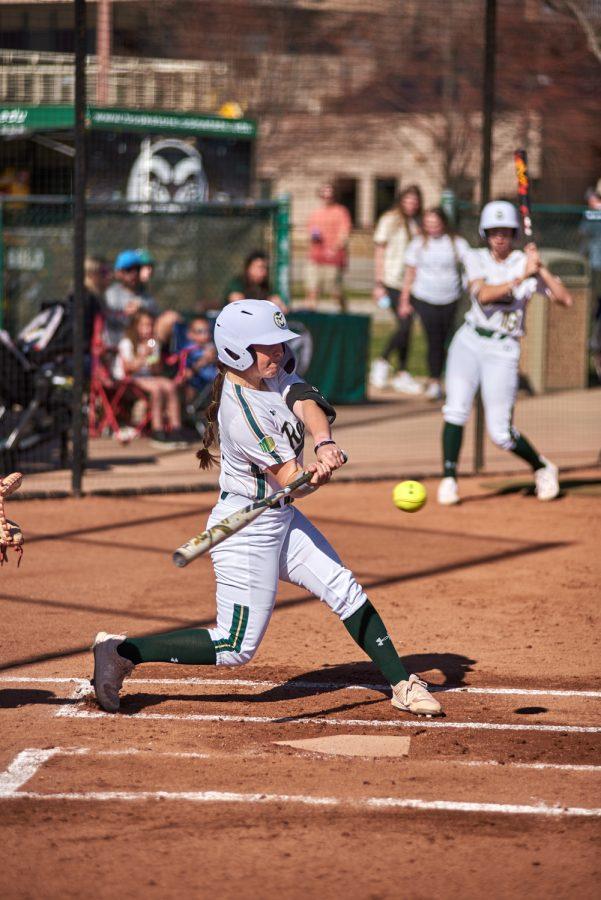 Colorado State catcher Peyton Allen (23) swings at the ball against the University of New Mexico April 8, 2022.