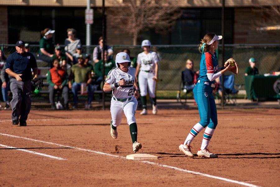 Colorado State midfielder Peyton Allen (23) runs into first base April 8, 2022.