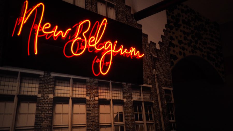 A neon New Belgium sign just outside the entrance to their factory floor April 9, 2022.