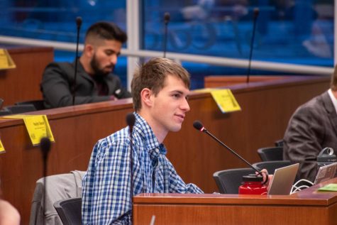 Evan Welch, the Associated Students of Colorado State University Chair of University Affairs, gives his committee report at the senate meeting Apr. 13, 2022.