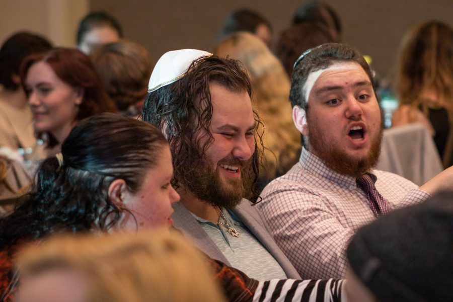 Person laughing at the Passover Seder on April 15 at the Lory Student Center.
