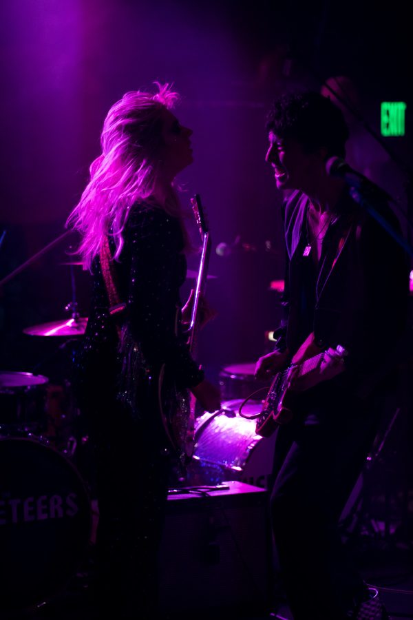 Demi Demitro, and Johnny Fig, of The Velveteers, playing an original song at The Aggie Theater April 16.