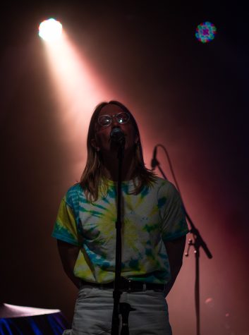 Jakob Mueller, lead singer for the band Cody, sings an original song April 16. Oliver Mueller, the bassist of Cody, is Jakob’s brother.