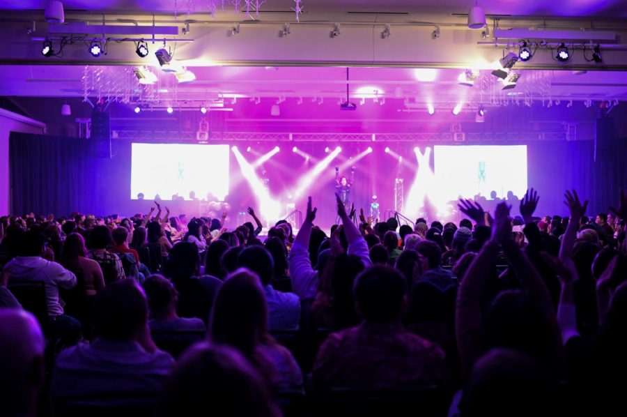 Audience members cheer during Lala Queen’s performance