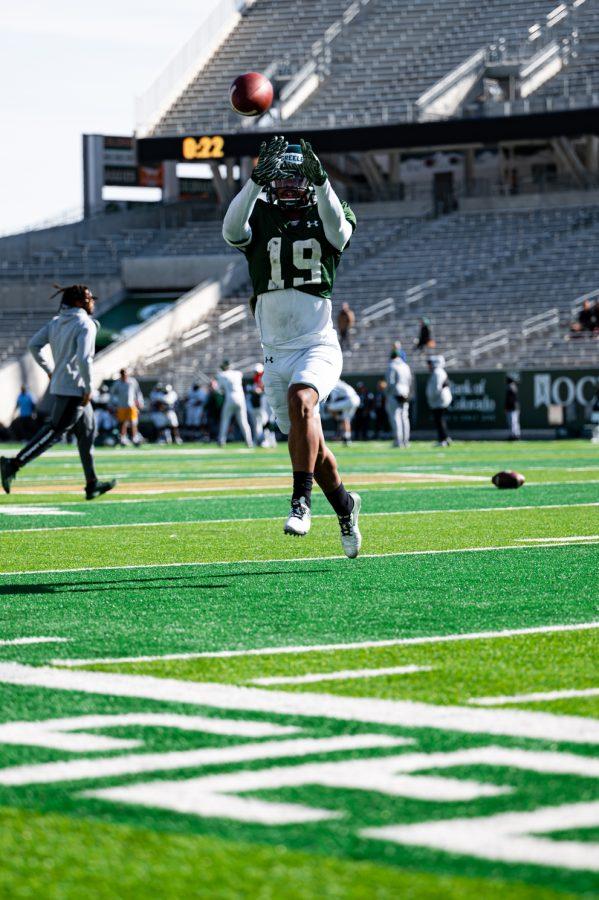 Colorado State University defensive back DAndre Greeley catches a pass during practice in Canvas Stadium